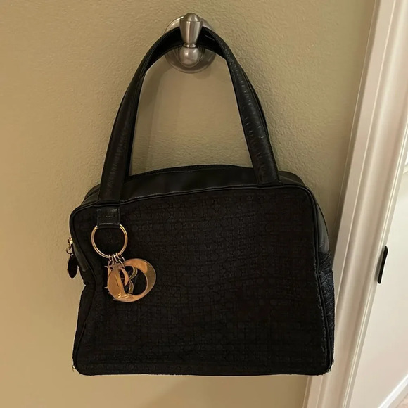 Dior woman's black qulited purse